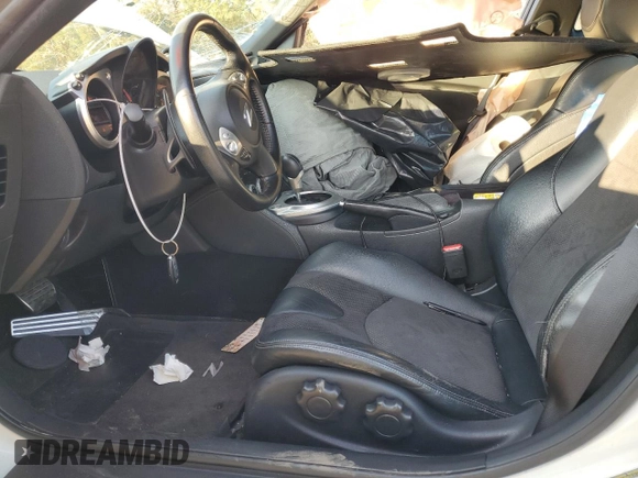 2014 Nissan 370Z Touring with VIN JN1AZ4EH8EM631324, listed as a Copart auction lot 85573524 with 0 mi miles and Salvage Title. Bid and sale history available at carsss.com. Image 7.