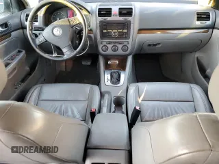 2005 Volkswagen Jetta 2.5L with VIN 3VWDF71K35M616950, listed as a Copart auction lot 83989094 with 169,516 mi miles and Salvage title. Bid and sale history available at DreamBid. Image 8.