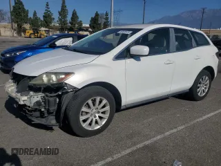 2010 Mazda CX-7 Sport z VIN JM3ER2WM5A0323602, wystawiony jako Copart lot #56932975 z przebiegiem 111 891 mil mil oraz Szkody całkowita. Historia ofert i sprzedaży dostępna na DreamBid. Obrazek 1.