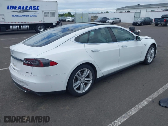 2016 Tesla Model S 90D with VIN 5YJSA1E21GF121962, listed as a IAAI auction lot 42130291 with 114,670 mi miles and . Bid and sale history available at DreamBid. Image 4.