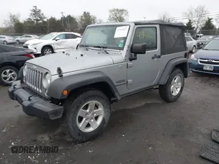 2015 Jeep Wrangler Sport with VIN 1C4AJWAG6FL501160, listed as a IAAI auction lot 41941661 with 134,842 mi miles. Bid and sale history available at carsss.com. Image 17.