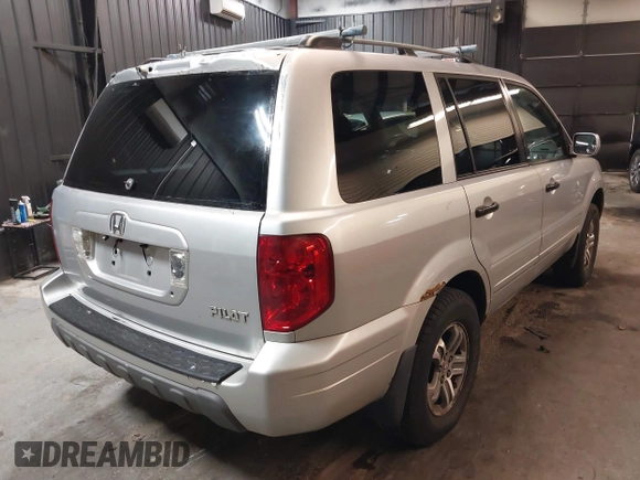 2005 Honda Pilot EX with VIN 5FNYF18465B031034, listed as a IAAI auction lot 41925858 with 194,211 mi miles and . Bid and sale history available at DreamBid. Image 4.