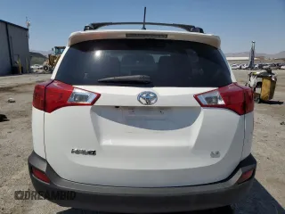 2014 Toyota RAV4 LE with VIN JTMZFREV7EJ018804, listed as a Copart auction lot 62738795 with 97,265 mi miles and Salvage title. Bid and sale history available at DreamBid. Image 6.