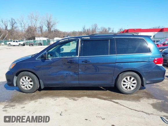 2010 Honda Odyssey EX-L with VIN 5FNRL3H76AB058912, listed as a IAAI auction lot 41558361 with 206,841 mi miles and . Bid and sale history available at DreamBid. Image 14.