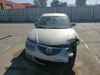 2005 Mazda 3 s with VIN JM1BK123051308514, listed as a Copart auction lot 51306365 with 185,771 mi miles and Salvage Title. Bid and sale history available at DreamBid. Image 11.