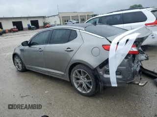 2013 Kia Optima SX with VIN 5XXGR4A62DG102323, listed as a Copart auction lot 59684425 with 210,005 mi miles and Salvage title. Bid and sale history available at DreamBid. Image 2.