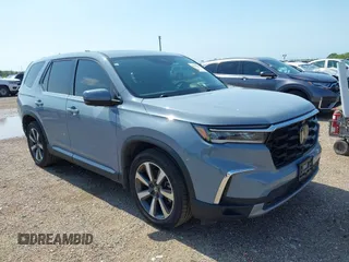 2023 Honda Pilot Elite with VIN 5FNYG1H83PB030149, listed as a IAAI auction lot 42344245 with 45,543 mi miles and . Bid and sale history available at DreamBid. Image 1.