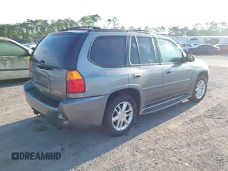 2008 GMC Envoy Denali with VIN 1GKES63M982258281, listed as a IAAI auction lot 42022548 with 265,129 mi miles. Bid and sale history available at carsss.com. Image 4.