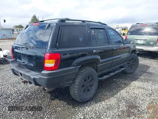 2001 Jeep Grand Cherokee Laredo with VIN 1J4GW48N61C642351, listed as a IAAI auction lot 41783127 with 194,578 mi miles and . Bid and sale history available at DreamBid. Image 4.