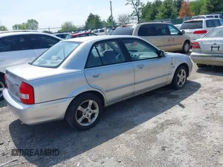 2003 Mazda Protege DX z VIN JM1BJ225430131527, wystawiony jako IAAI lot #42144261 z przebiegiem 215 988 mil mil oraz . Historia ofert i sprzedaży dostępna na DreamBid. Obrazek 4.