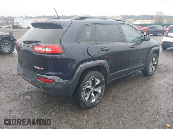 2014 Jeep Cherokee Trailhawk with VIN 1C4PJMBB5EW120432, listed as a IAAI auction lot 41973114 with 88,795 mi miles. Bid and sale history available at carsss.com. Image 4.