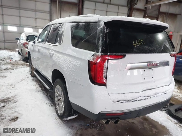 2023 GMC Yukon Denali with VIN 1GKS2DKL5PR266660, listed as a IAAI auction lot 41618299 with 53,440 mi miles. Bid and sale history available at carsss.com. Image 3.