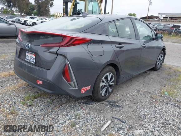 2017 Toyota Prius Plus with VIN JTDKARFP7H3054775, listed as a IAAI auction lot 42023670 with 80,759 mi miles and . Bid and sale history available at DreamBid. Image 4.