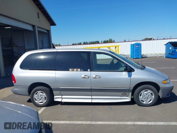 2000 Dodge Caravan SE with VIN 1B4GP44G1YB680819, listed as a IAAI auction lot 42057681 with 23,422 mi miles. Bid and sale history available at carsss.com. Image 12.