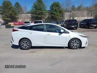 2021 Toyota Prius LE with VIN JTDKAMFP8M3174629, listed as a IAAI auction lot 42087974 with 16,348 mi miles and . Bid and sale history available at DreamBid. Image 13.