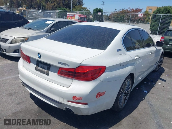 2018 BMW 5 Series 530e with VIN WBAJA9C58JB252868, listed as a IAAI auction lot 42323949 with 100,530 mi miles and . Bid and sale history available at DreamBid. Image 4.