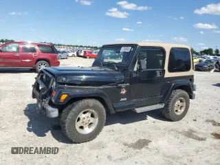2001 Jeep Wrangler Sahara z VIN 1J4FA59S71P343366, wystawiony jako Copart lot #57826405 z przebiegiem 156 436 mil mil oraz Szkoda całkowita • Salvage title. Historia ofert i sprzedaży dostępna na DreamBid. Obrazek 1.