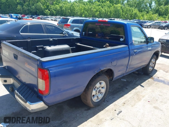 1998 Nissan Frontier XE with VIN 1N6DD21S8WC318499, listed as a IAAI auction lot 42329613 with Not provided miles and . Bid and sale history available at DreamBid. Image 4.