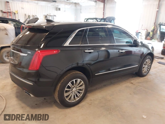 2019 Cadillac XT5 Luxury FWD z VIN 1GYKNCRS2KZ197052, wystawiony jako IAAI lot #42242466 z przebiegiem 86 678 mil mil oraz . Historia ofert i sprzedaży dostępna na DreamBid. Obrazek 4.