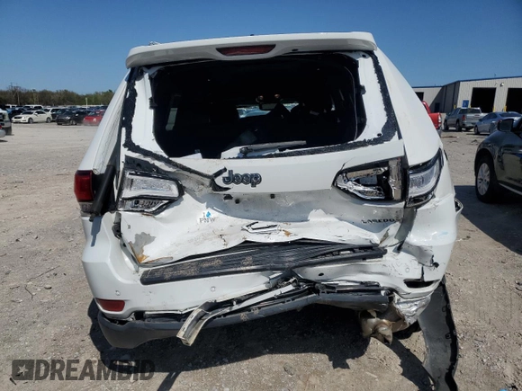 2022 Jeep Grand Cherokee Laredo X with VIN 1C4RJEAG1NC155952, listed as a Copart auction lot 52170235 with 74,695 mi miles and Salvage title. Bid and sale history available at DreamBid. Image 6.