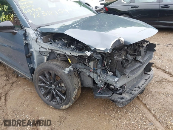 2022 Mazda CX-9 Grand Touring with VIN JM3TCBDY0N0615968, listed as a IAAI auction lot 42312159 with 22,912 mi miles and . Bid and sale history available at DreamBid. Image 6.