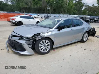 2018 Toyota Camry LE с VIN 4T1B11HK3JU525478, выставлен на аукционе Copart как лот 56112235 с пробегом 141 609 миль миль и Списание • Salvage title. История ставок и продаж доступна на DreamBid. Изображение 1.