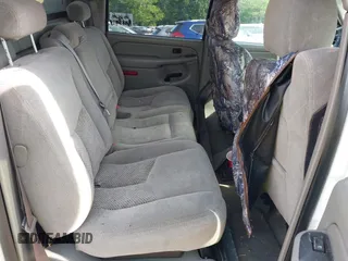 2005 Chevrolet Avalanche LS z VIN 3GNEK12Z25G284906, wystawiony jako IAAI lot #42289851 z przebiegiem 242 793 mil mil oraz . Historia ofert i sprzedaży dostępna na DreamBid. Obrazek 8.