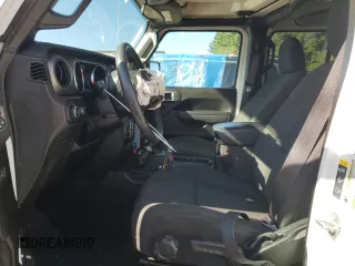 2022 Jeep Wrangler Unlimited High Tide with VIN 1C4HJXDG9NW132131, listed as a Copart auction lot 69314354 with 33,711 mi miles and Salvage Title. Bid and sale history available at DreamBid. Image 7.