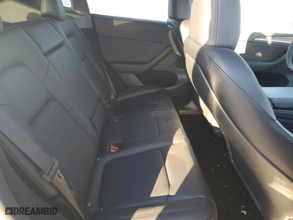 2024 Tesla Model Y with VIN 7SAYGDED1RF154851, listed as a Copart auction lot 87863255 with 5,878 mi miles and Salvage Title. Bid and sale history available at carsss.com. Image 12.