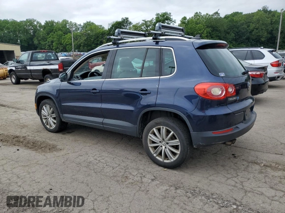 2011 Volkswagen Tiguan SEL z VIN WVGBV7AX2BW534482, wystawiony jako Copart lot #61097265 z przebiegiem 186 282 mil mil oraz Czysty tytuł • Clean title. Historia ofert i sprzedaży dostępna na DreamBid. Obrazek 2.