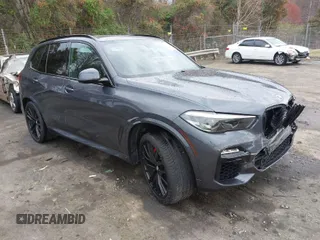 2021 BMW X5 xDrive40i with VIN 5UXCR6C01M9H56800, listed as a IAAI auction lot 41860035 with 51,779 mi miles. Bid and sale history available at carsss.com. Image 1.