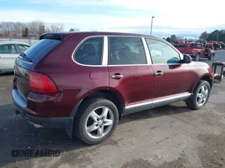 2004 Porsche Cayenne S with VIN WP1AB29P94LA69956, listed as a IAAI auction lot 41807608 with 155,831 mi miles. Bid and sale history available at carsss.com. Image 4.