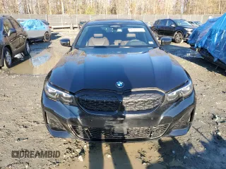 2022 BMW 3 Series M340i xDrive with VIN 3MW5U9J09N8C36136, listed as a Copart auction lot 76598524 with 45,311 mi miles and Salvage Title. Bid and sale history available at carsss.com. Image 5.