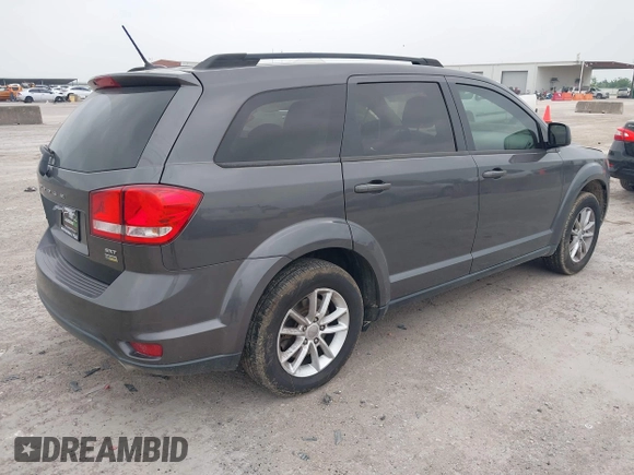 2015 Dodge Journey SXT with VIN 3C4PDCBG2FT649308, listed as a IAAI auction lot 42285409 with 140,668 mi miles and . Bid and sale history available at DreamBid. Image 4.