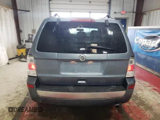 2010 Mercury Mariner z VIN 4M2CN9B70AKJ24170, wystawiony jako Copart lot #49241535 z przebiegiem 118 661 mil mil oraz Szkody całkowita. Historia ofert i sprzedaży dostępna na DreamBid. Obrazek 6.