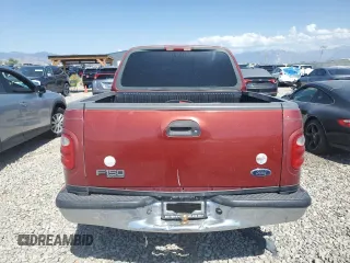 2001 Ford F-150 XLT with VIN 1FTRW07W71KE22482, listed as a Copart auction lot 62546815 with 218,501 mi miles and Clean title. Bid and sale history available at DreamBid. Image 6.