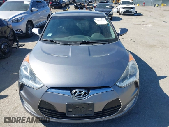 2013 Hyundai Veloster w/Black Int with VIN KMHTC6AD5DU095867, listed as a IAAI auction lot 42698380 with 115,528 mi miles and . Bid and sale history available at DreamBid. Image 6.