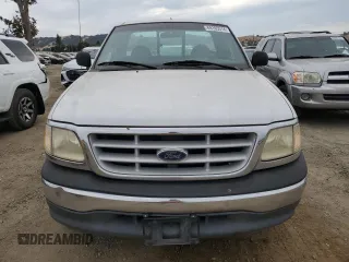 1999 Ford F-150 XL z VIN 1FTRF17L3XKA66147, wystawiony jako Copart lot #69105514 z przebiegiem 179 426 mil mil oraz Czysty tytuł • Clean title. Historia ofert i sprzedaży dostępna na DreamBid. Obrazek 5.