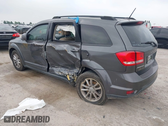 2015 Dodge Journey SXT with VIN 3C4PDCBG2FT649308, listed as a IAAI auction lot 42285409 with 140,668 mi miles and . Bid and sale history available at DreamBid. Image 3.
