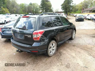 2014 Subaru Forester 2.5i Premium with VIN JF2SJAEC1EH477920, listed as a IAAI auction lot 41974390 with 145,837 mi miles. Bid and sale history available at carsss.com. Image 4.