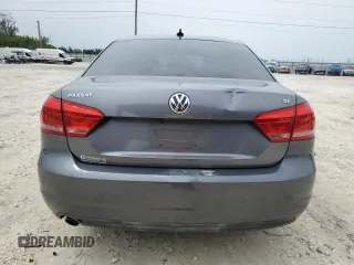 2012 Volkswagen Passat SE z VIN 1VWBP7A32CC063994, wystawiony jako Copart lot #59270995 z przebiegiem 169 999 mil mil oraz Szkoda całkowita • Salvage title. Historia ofert i sprzedaży dostępna na DreamBid. Obrazek 6.