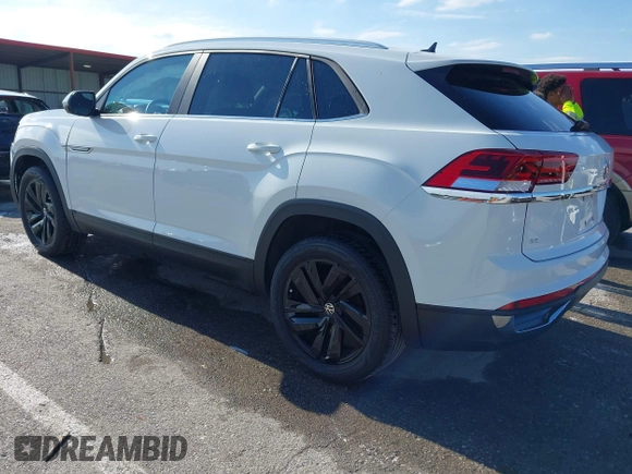 2023 Volkswagen Atlas SE with VIN 1V2WC2CA3PC228213, listed as a IAAI auction lot 42330049 with 21,884 mi miles and . Bid and sale history available at DreamBid. Image 3.