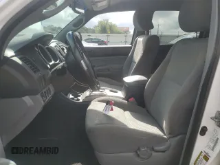 2013 Toyota Tacoma z VIN 5TFMU4FN1DX016379, wystawiony jako Copart lot #57460865 z przebiegiem 174 821 mil mil oraz Szkoda całkowita • Salvage title. Historia ofert i sprzedaży dostępna na DreamBid. Obrazek 7.