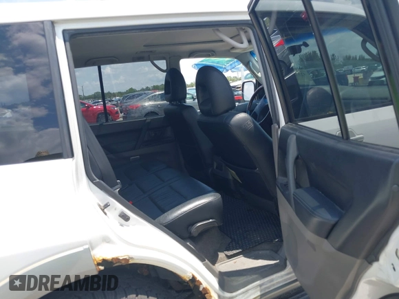 2002 Mitsubishi Montero Limited z VIN JA4MW51R82J060397, wystawiony jako IAAI lot #42343483 z przebiegiem 148 058 mil mil oraz . Historia ofert i sprzedaży dostępna na DreamBid. Obrazek 8.
