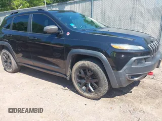 2014 Jeep Cherokee Trailhawk with VIN 1C4PJMBB5EW317746, listed as a IAAI auction lot 42629371 with 164,612 mi miles and . Bid and sale history available at DreamBid. Image 1.