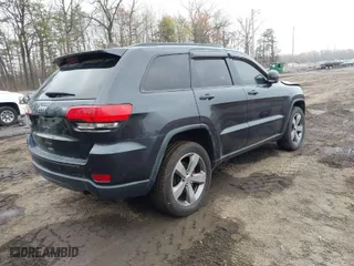 2015 Jeep Grand Cherokee Limited with VIN 1C4RJFBG0FC608061, listed as a IAAI auction lot 40254208 with 91,258 mi miles. Bid and sale history available at carsss.com. Image 4.