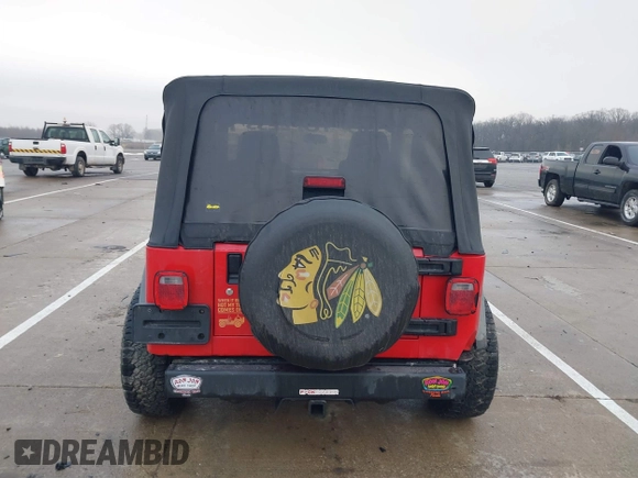 2006 Jeep Wrangler SE with VIN 1J4FA29156P762295, listed as a IAAI auction lot 41669950 with 163,492 mi miles and . Bid and sale history available at DreamBid. Image 16.