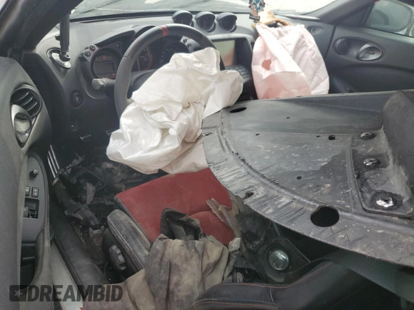 2015 Nissan 370Z с VIN JN1AZ4EH2FM441536, выставлен на аукционе Copart как лот 53433965 с пробегом Не указан миль и Списание • Salvage title. История ставок и продаж доступна на DreamBid. Изображение 7.