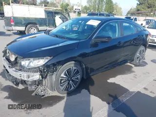 2016 Honda Civic Sedan EX-L with VIN 19XFC1F73GE215112, listed as a IAAI auction lot 42093218 with 67,233 mi miles. Bid and sale history available at carsss.com. Image 21.