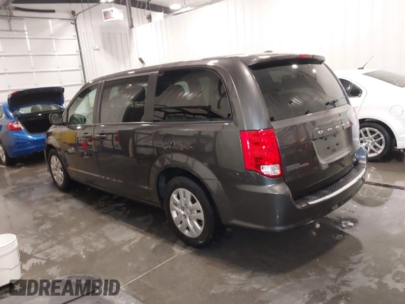 2019 Dodge Grand Caravan SE with VIN 2C4RDGBG9KR527770, listed as a IAAI auction lot 41571473 with 101,310 mi miles and . Bid and sale history available at DreamBid. Image 3.